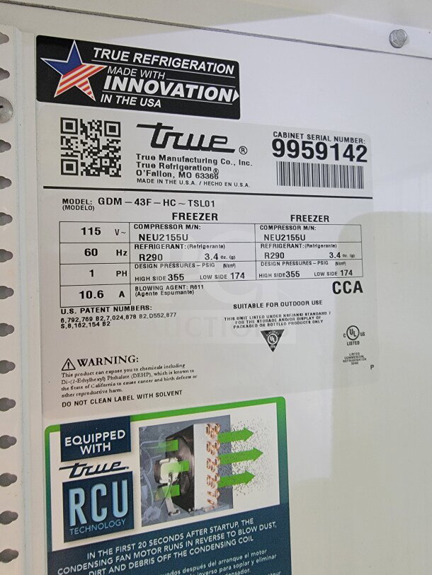 Label on True freezer in SDG mobile trailer, Model GDM-43F-HC~TSL01. Shows specs, serial number 9959142, and RCU technology info.