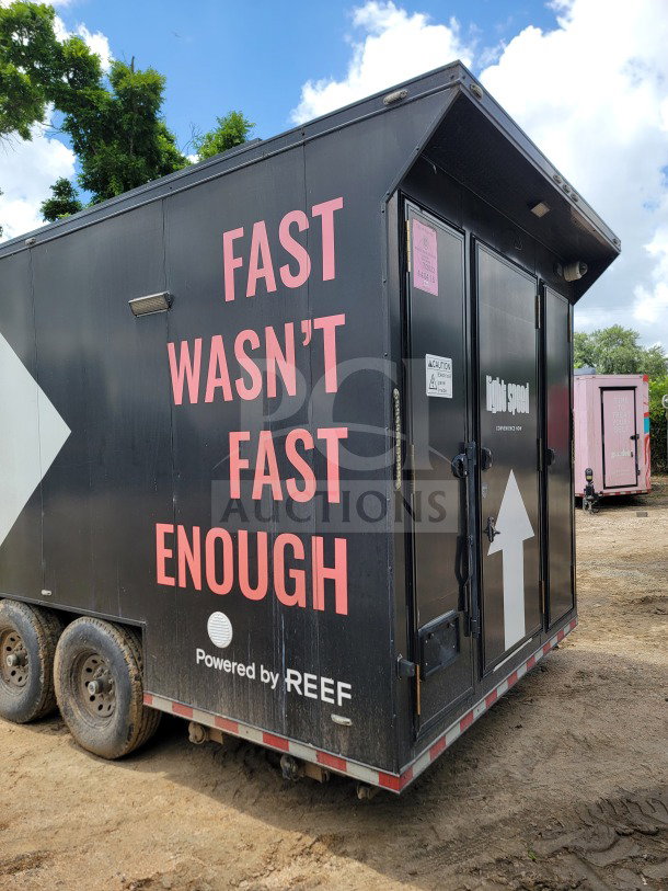 2021 SDG 8.5' x 20' tandem-axle mobile trailer, black exterior, "Fast Wasn't Fast Enough" text, powered by REEF.