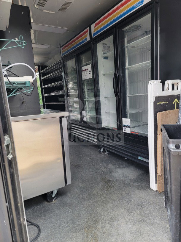 2021 SDG 8.5' x 20' mobile trailer interior with merchandisers, freezers, POS workstation. Excellent condition.