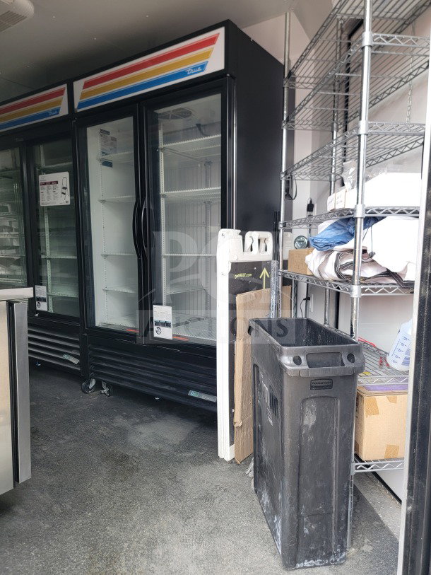 2021 SDG 8.5' x 20' mobile trailer interior with True merchandisers, freezers, POS workstation, and shelving. Model 20.