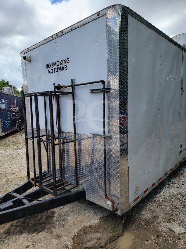 2021 Diamond Cargo 8.5' x 24' mobile kitchen trailer, tandem-axle, GVWR 14,000 LB, labeled "No Smoking," visible trailer hitch.