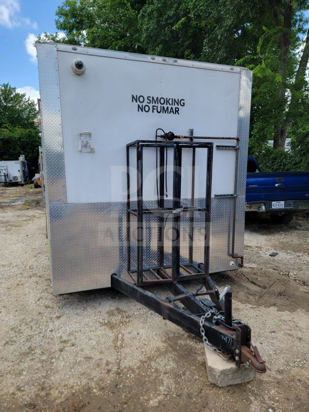 2021 Diamond Cargo 8.5' x 24' mobile kitchen trailer, tandem-axle, "No Smoking" label, steel frame, 14,000 LB GVWR.