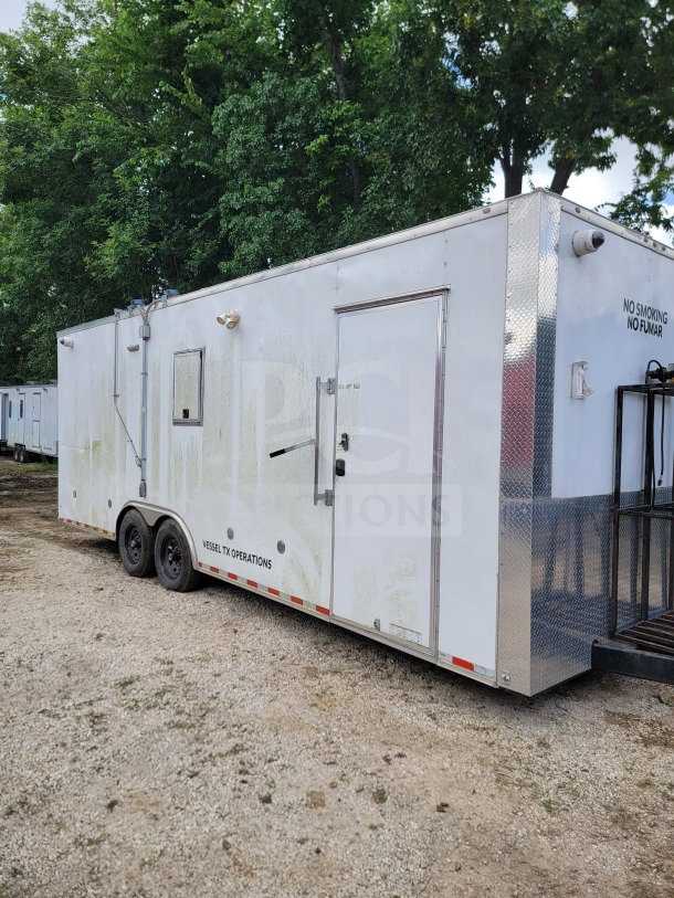 2021 Diamond Cargo 8.5' x 24' mobile kitchen trailer with tandem axles, 14,000 LB GVWR, NAKS hood, Pitco fryers, and refrigeration units. VIN 53NBE2425M1090171. Exterior shows some wear.