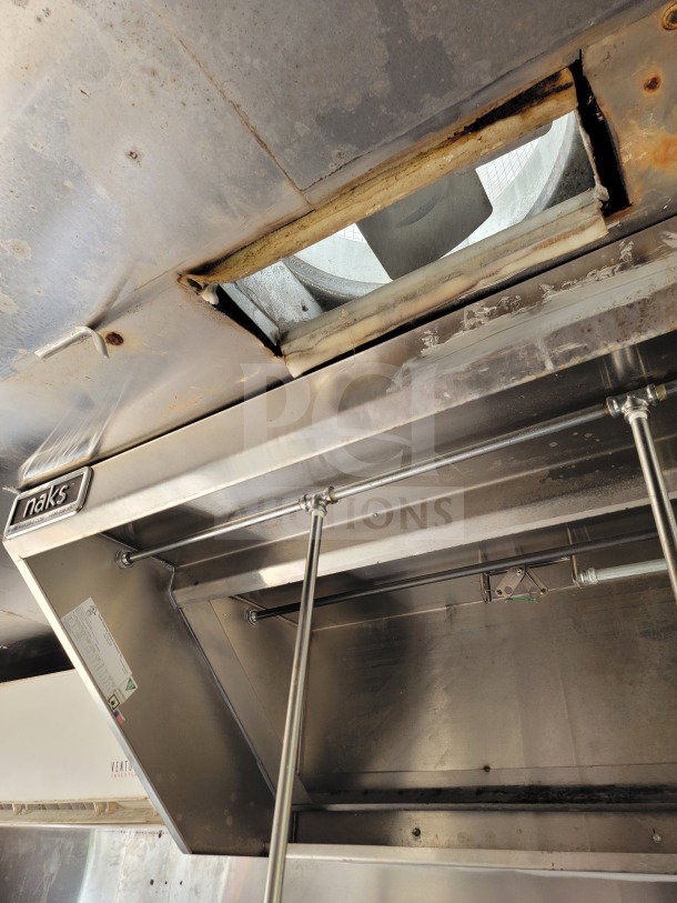 NAKS hood in Diamond Cargo mobile kitchen trailer, showing ventilation system details and stainless steel construction.