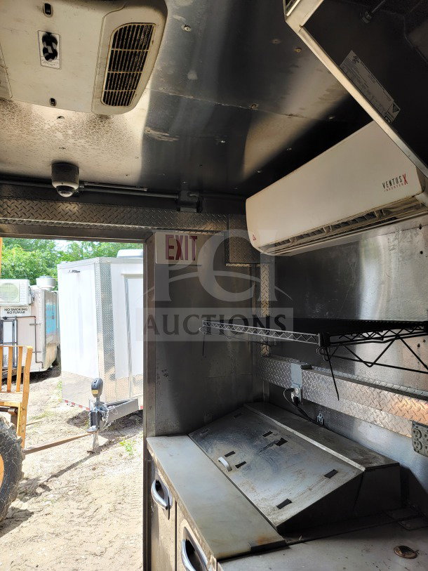 2021 Diamond Cargo 8.5' x 24' mobile kitchen trailer interior with VentusX ventilation, shelving, and prep area.