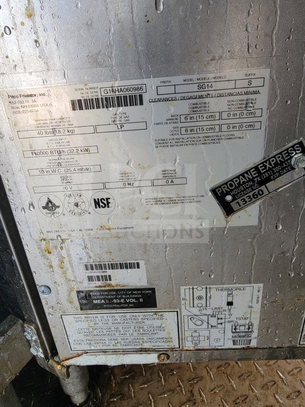 Labels on Pitco fryer specify model SG14, serial number G16HA060986, 115,000 BTU/hr, LP gas, certified for NYC use.
