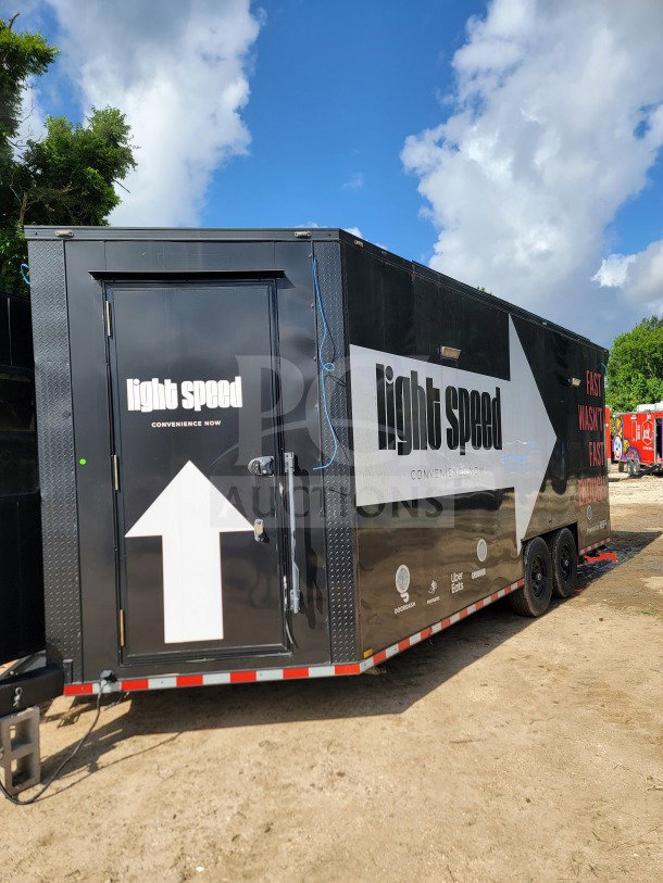2021 SDG 8.5' x 20' dual-axle mobile kitchen trailer, black with "light speed" branding, equipped with CaptiveAire hood.