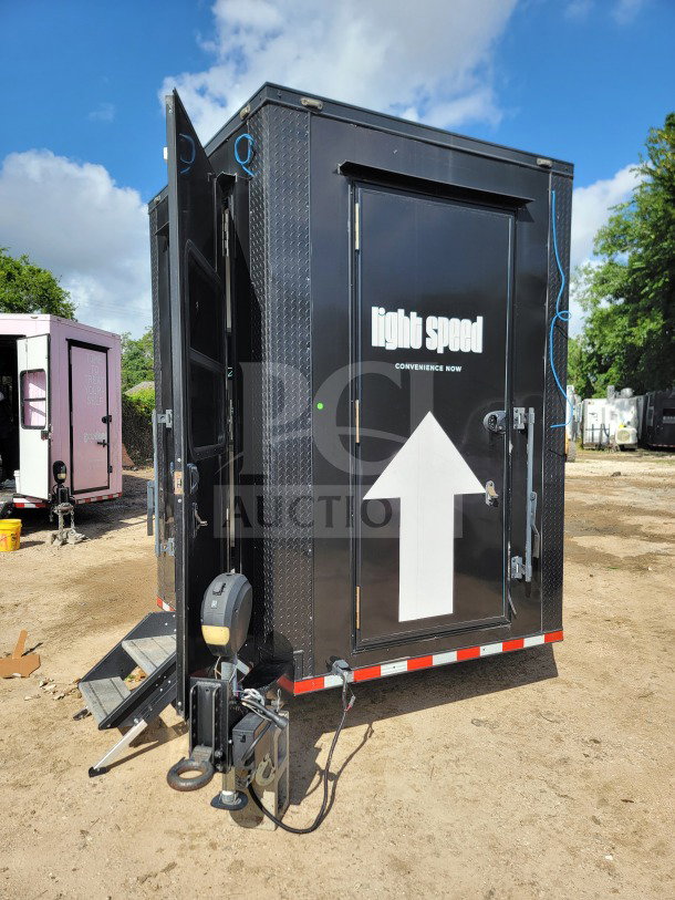 2021 SDG 8.5' x 20' dual-axle mobile kitchen trailer. Features CaptiveAire hood, True refrigeration, and corporate delivery setup.