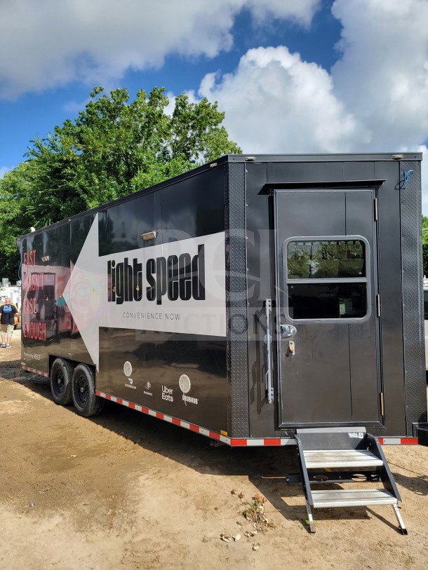 2021 SDG 8.5' x 20' dual-axle mobile kitchen trailer with CaptiveAire hood, True Refrigeration, corporate delivery branding.