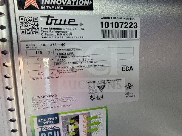 True Refrigeration label on mobile kitchen trailer with model TUC-27F-HC, serial 10107223, 115V, R290 refrigerant.