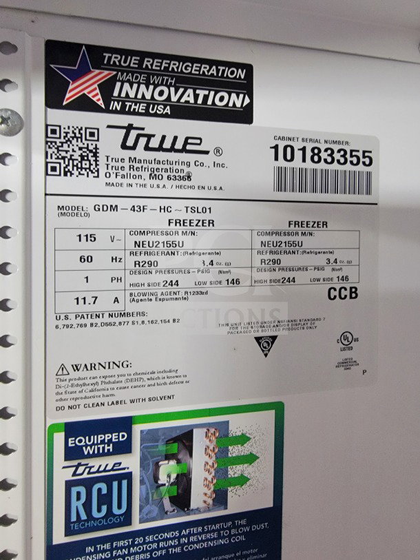 Label from True Refrigeration showing model GDM-43F, compressor NEU2155U, refrigerant R290, and serial number 10183355.