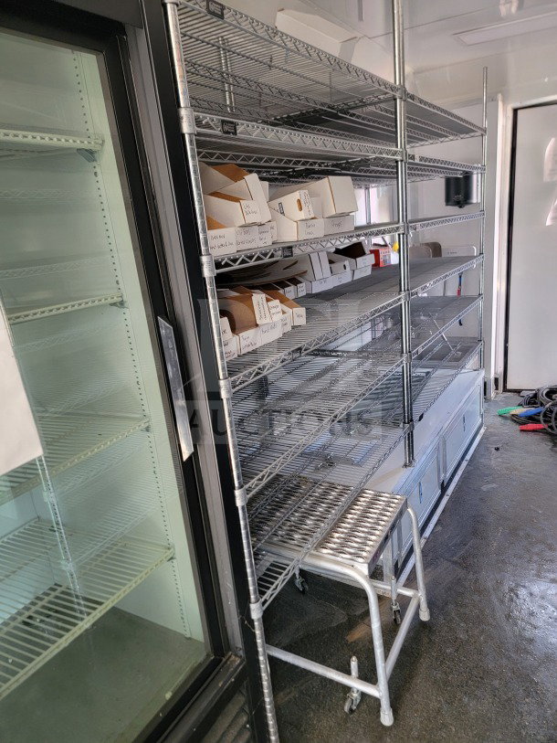 2021 SDG 8.5' x 20' double-axle mobile trailer interior with metal shelving and cold-storage configuration.
