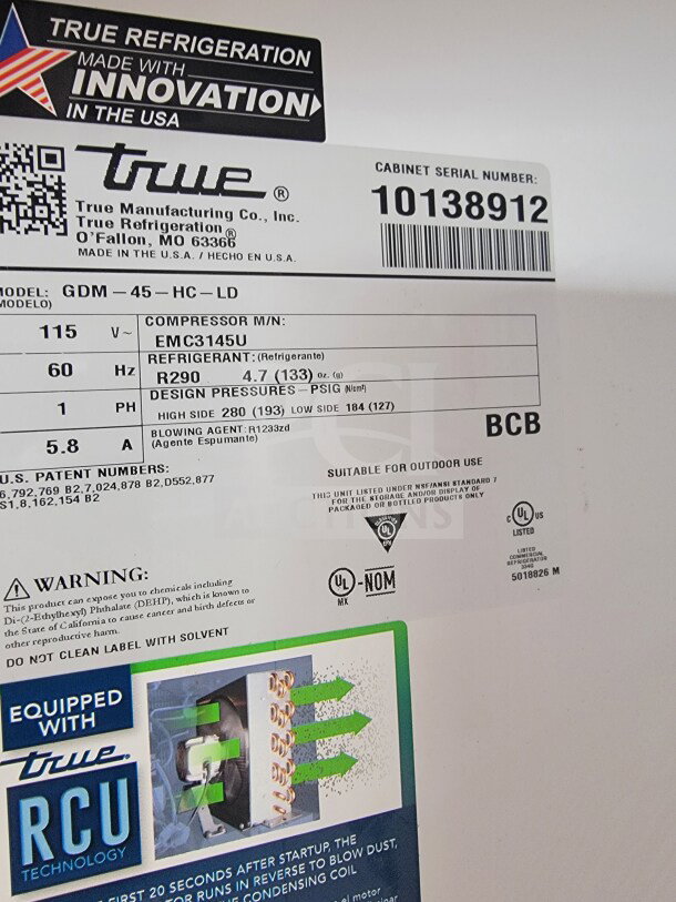 Label on a True Refrigeration unit, model GDM-45-HC-LD, compressor EMC3145U, using R290 refrigerant. Serial number 10138912.