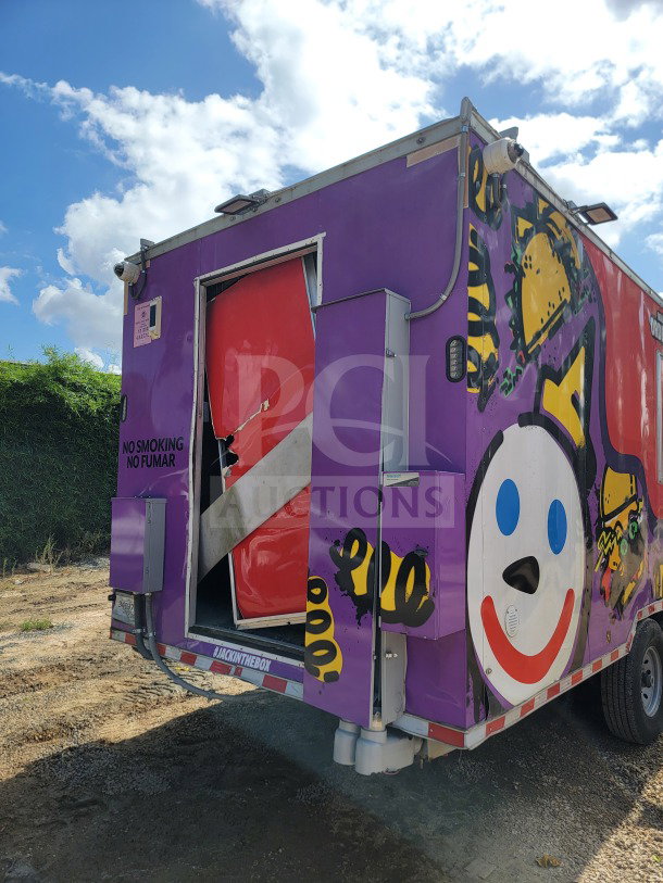 Rock Solid Cargo 8.5' x 24' dual-axle mobile kitchen trailer with CaptiveAire hood and vibrant exterior graphics.