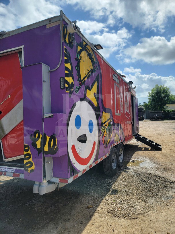 2021 Rock Solid Cargo mobile kitchen trailer, 8.5' x 24', dual-axle, vibrant wrap design, CaptiveAire hood, True & Hoshizaki refrigeration.
