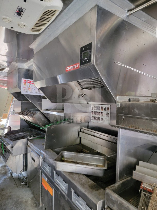 2021 Rock Solid Mobile Kitchen Trailer interior with CaptiveAire hood, True & Hoshizaki refrigeration. Dual-axle, 8.5' x 24'.