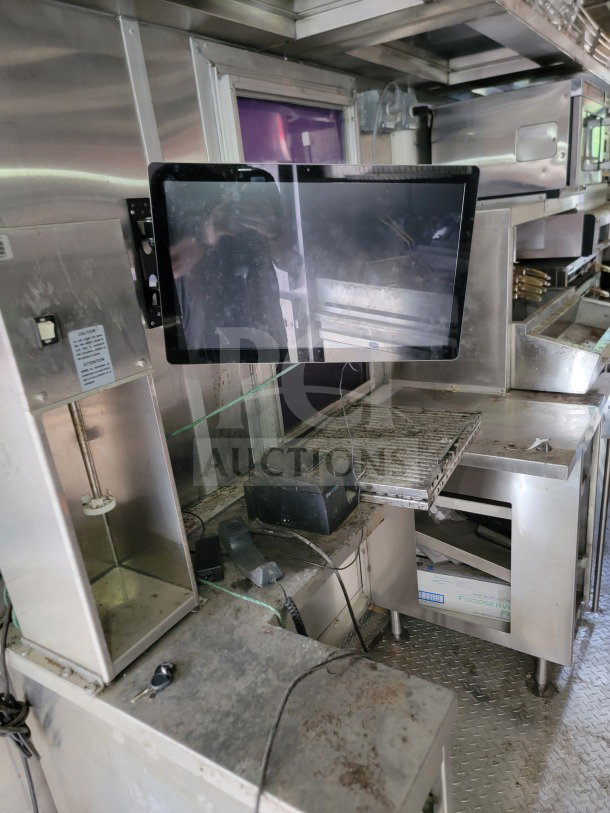 2021 Rock Solid Cargo 8.5'x24' mobile kitchen trailer interior. Features CaptiveAire hood and Hoshizaki refrigeration. Used condition.