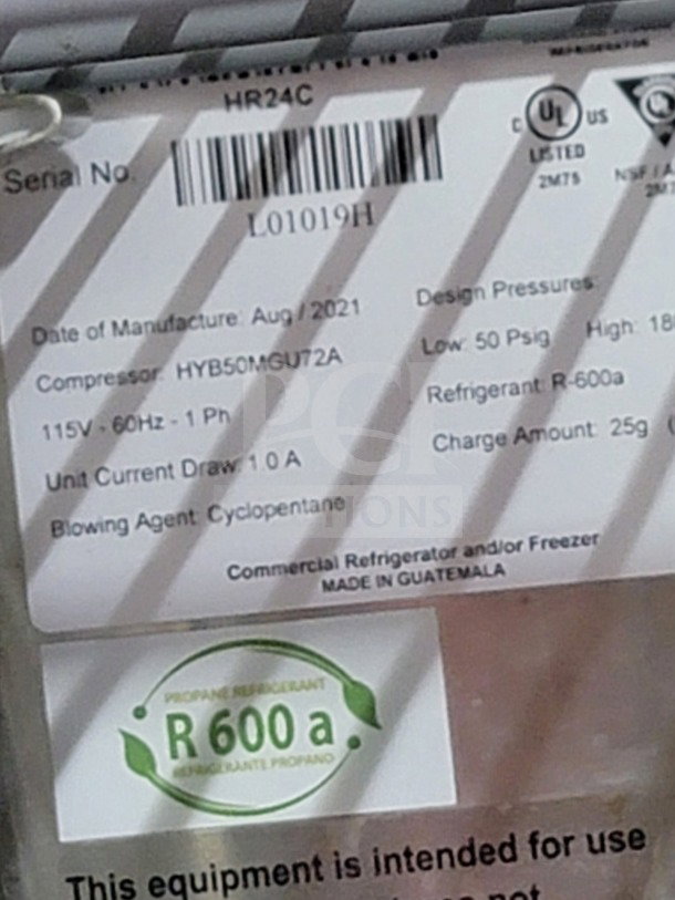 Label for refrigeration unit in mobile kitchen trailer, noting R-600a refrigerant, manufactured in August 2021 in Guatemala.