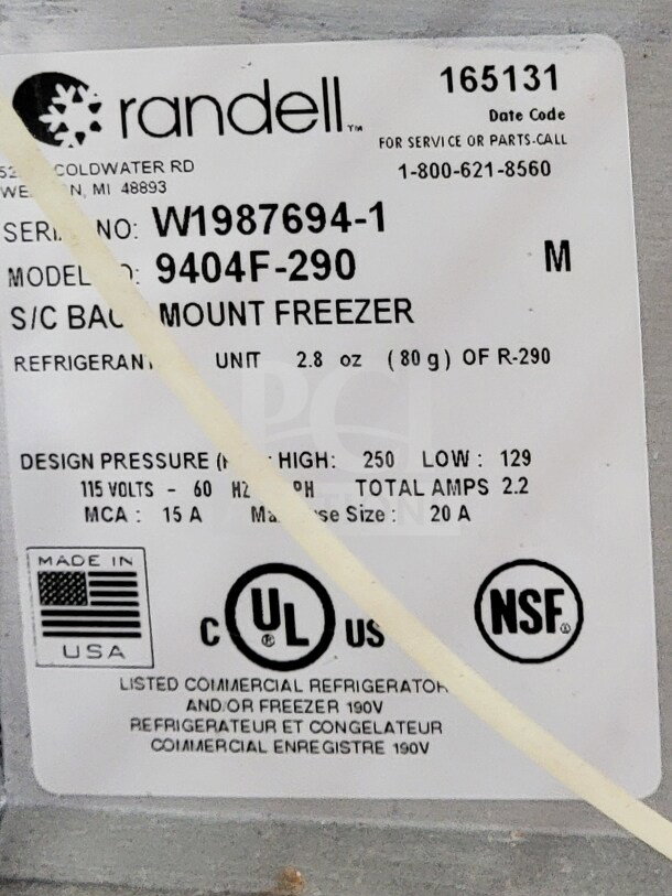 Label on Randell freezer showing model 9404F-290, 2.8 oz R-290 refrigerant, 115V, and certifications UL and NSF.