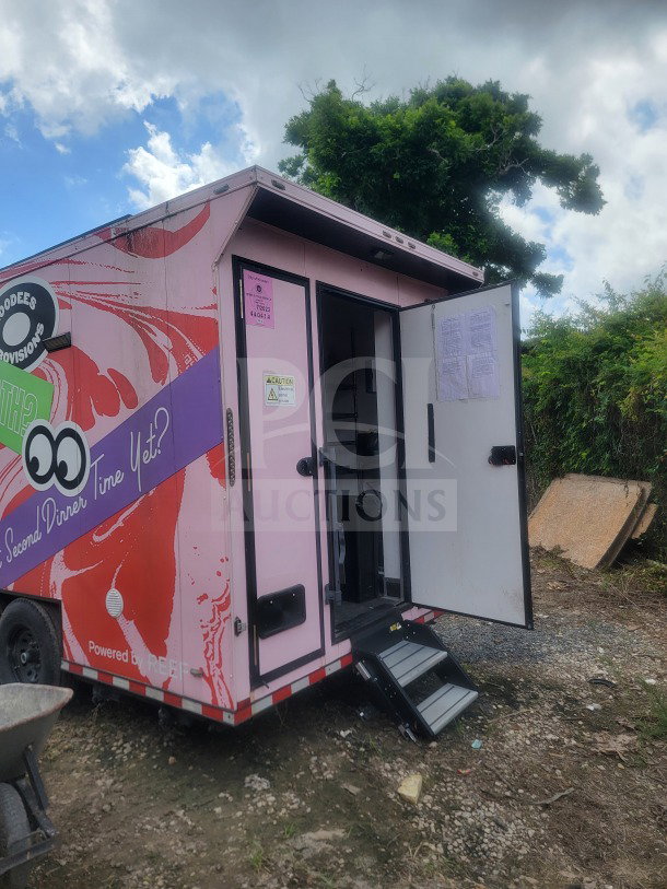 2021 SDG 8.5' x 20' dual-axle trailer with custom cold-chain storage, True glass-door refrigeration, VIN visible, open door.