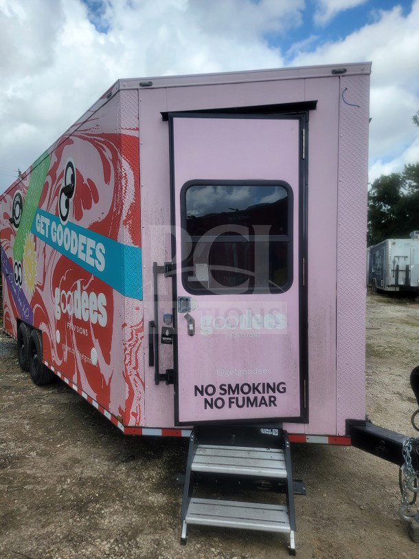 2021 SDG 8.5' x 20' dual-axle trailer with custom graphics, glass-door refrigeration, 120/208V, "No Smoking" label.