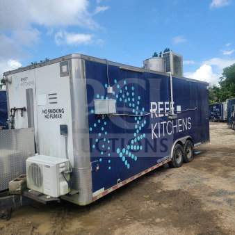 2021 Rock Solid Cargo 8.5' x 24' dual-axle mobile ghost kitchen trailer, blue, featuring Serv-Ware and American Range equipment.
