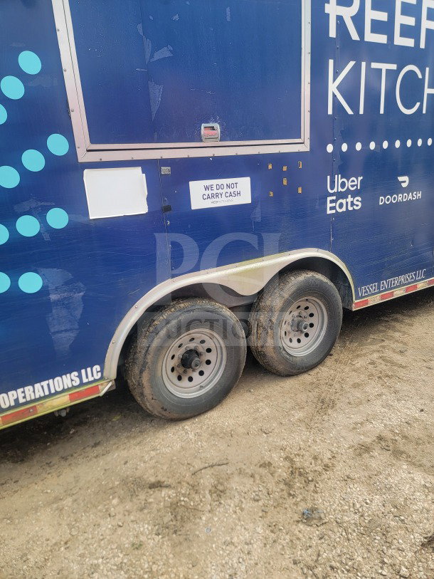 2021 Rock Solid Cargo 8.5' x 24' dual-axle mobile kitchen trailer, "We Do Not Carry Cash" sign visible.
