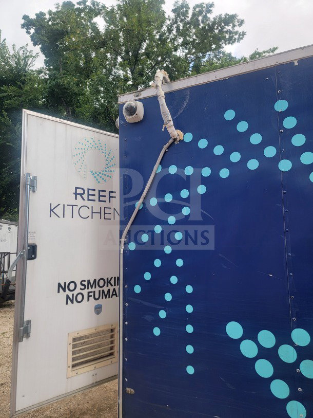 2021 Rock Solid Cargo 24' Mobile Ghost Kitchen Trailer, dual-axle, "REEF KITCHEN" branding, no smoking sign, camera installed.