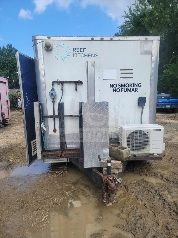 2021 Rock Solid Cargo 8.5' x 24' mobile ghost kitchen trailer with dual-axle, Serv-Ware refrigeration, and American Range fry line.