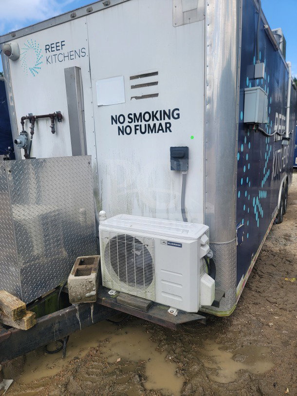 2021 Rock Solid Cargo 8.5' x 24' dual-axle trailer, "NO SMOKING" sign, exterior equipment visible.