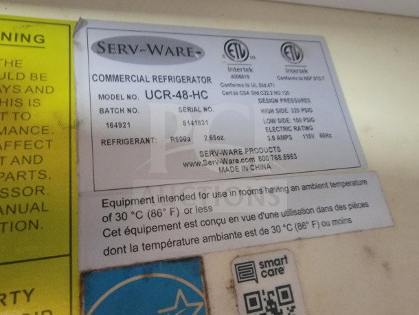 Label from a Serv-Ware commercial refrigerator. Model UCR-48-HC, R600a refrigerant, 3.0 amps, for 30°C max ambient use.