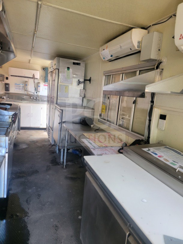 2021 Rock Solid Cargo 8.5' x 24' mobile ghost kitchen trailer interior with American Range fry line, Serv-Ware refrigeration, and prep areas.