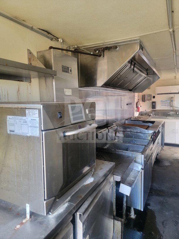 2021 Rock Solid Cargo 24' mobile ghost kitchen trailer, dual-axle, complete Serv-Ware refrigeration, American Range fry line.