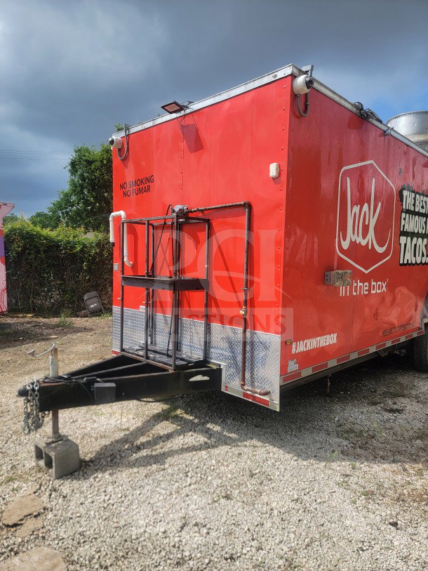 2021 Titanium Cargo 8.5' x 24' QSR Kitchen Trailer, red, dual-axle, CaptiveAire ventilation, Jack in the Box branding.