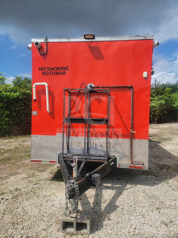 2021 Titanium Cargo 8.5' x 24' mobile kitchen trailer, red, with dual-axle, "No Smoking" sign, pristine condition.