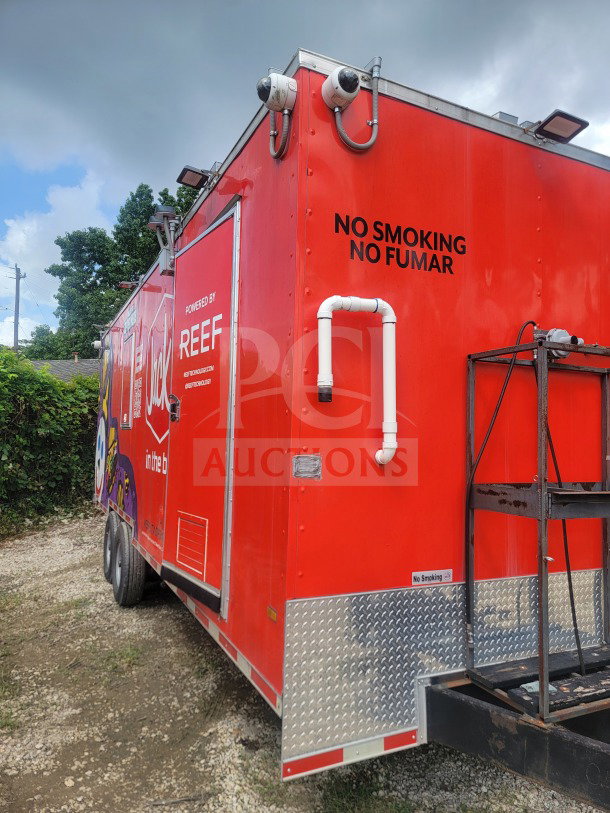 2021 Titanium Cargo 8.5' x 24' mobile kitchen trailer, red exterior, equipped with CaptiveAire ventilation, dual-axle, "No Smoking" signage.