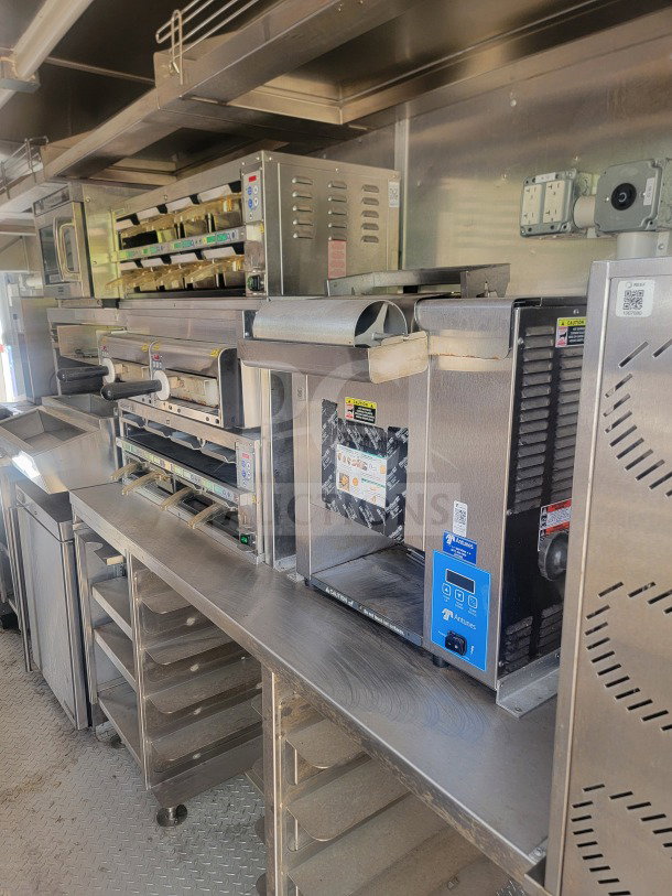 2021 Titanium Cargo 8.5' x 24' kitchen trailer interior, featuring dual-axle, equipment from True & Randell, CaptiveAire ventilation.