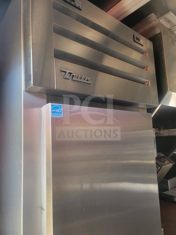 Stainless steel True refrigeration unit in Titanium Cargo mobile kitchen trailer, featuring an Energy Star label for efficiency.