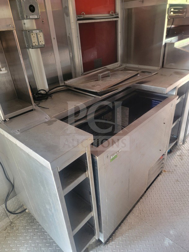2021 Titanium Cargo 8.5' x 24' kitchen trailer interior, featuring CaptiveAire ventilation and True & Randell equipment.