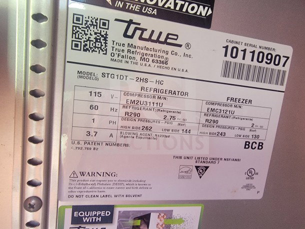 Label on True Manufacturing refrigeration unit; Model STG1DT-2HS-HC, uses R290 refrigerant, 115V, 60Hz, serial 10110907.