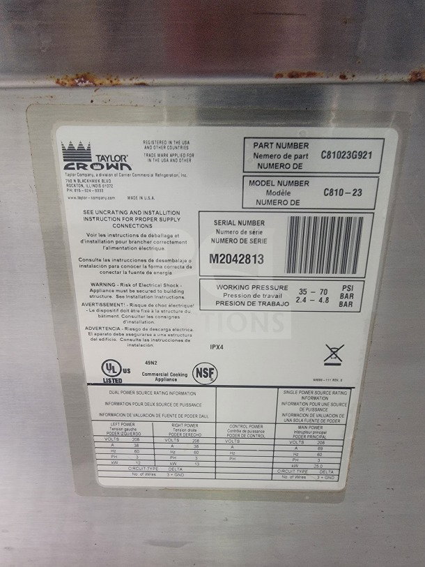 Label on Taylor Crown appliance for commercial kitchen, showing part number C81023G921 and serial number M2042813.