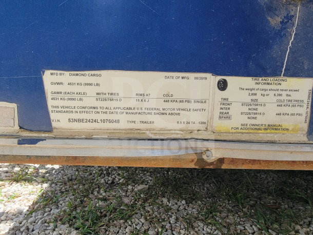 2019 Diamond Cargo 8.5' x 24' dual-axle mobile kitchen trailer label with VIN 53NBE2424L1076048, labeled specs and tire info.
