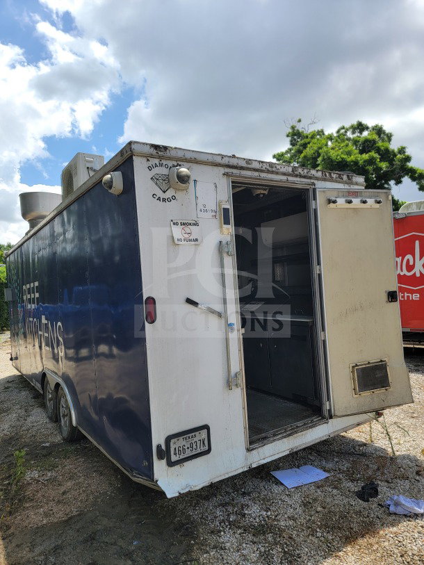 2019 Diamond Cargo 8.5' x 24' dual-axle mobile kitchen trailer, exterior view, "REEF KITCHENS" logo, open door, no smoking sign.