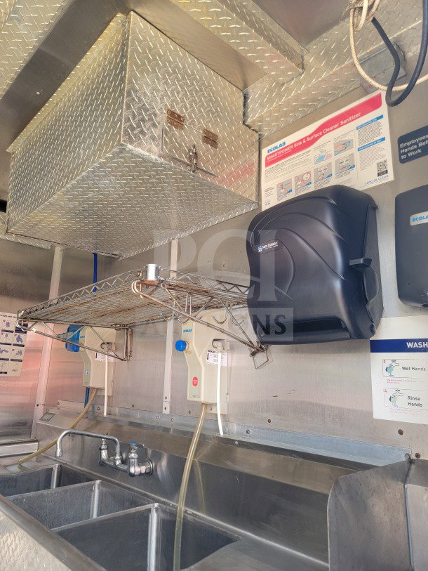 2019 Diamond Cargo 8.5' x 24' mobile kitchen interior, features Arctic Air storage, Wells Cooking line, Ecolab sanitizer setup.