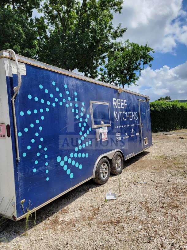 2019 Diamond Cargo 8.5' x 24' dual-axle mobile kitchen trailer, blue exterior, "REEF Kitchens" branding, good condition.