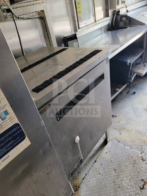 2019 Diamond Cargo 8.5' x 24' mobile kitchen trailer interior. Features a complete Arctic Air storage suite. Used condition.
