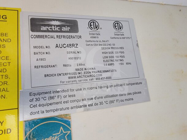 Arctic Air commercial refrigerator tag, model AUC48RZ, batch A1903, refrigerant R600a, 2.65oz. High side 320 PSIG.