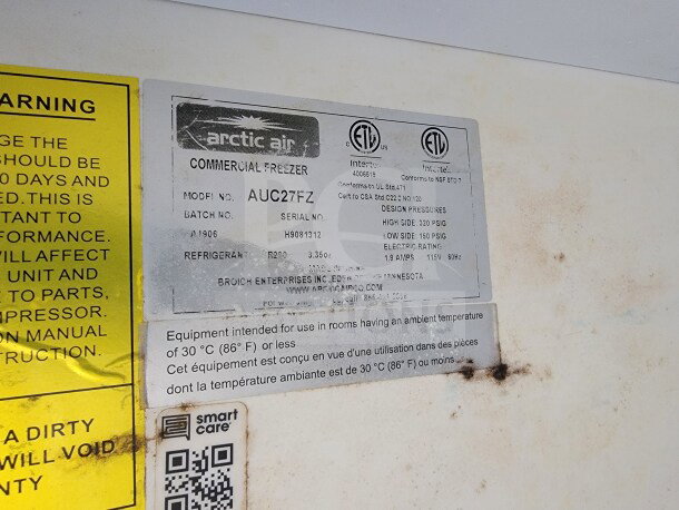 Label on Arctic Air Commercial Freezer, Model AUC27FZ, shows specs: 320/150 PSIG, 1.9 Amps, 115V, 60Hz.