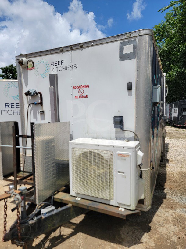 2019 Diamond Cargo 8.5' x 24' dual-axle mobile kitchen trailer with REEF Kitchens branding, air unit, and "No Smoking" sign.
