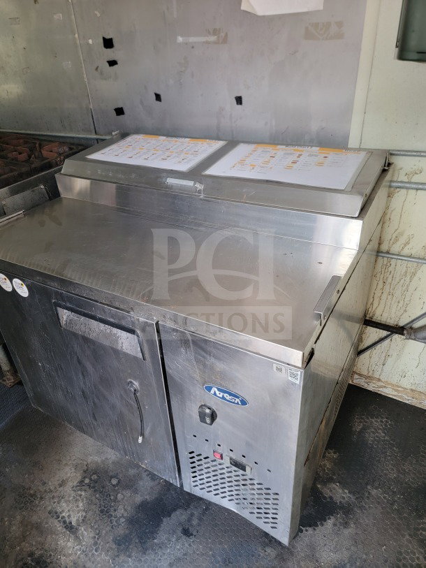 2019 Diamond Cargo 8.5' x 24' mobile kitchen trailer interior, featuring American Range fry line and Globe electric griddle.